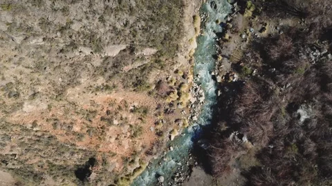 Top down aerial view. Pristine creek in the mountains of Mendoza, Argentina. Stock Footage 279490159