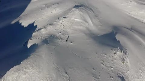 Top-Down Aerial View of Pristine Snow Surface on Mountain Stock Footage 332259569