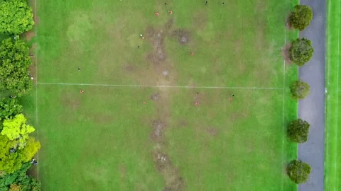 Top Down Aerial View of Public Soccer Field, Drone Flight from Goalpost to Stock Footage 306592293