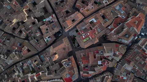 Top-Down Aerial View of the Red-Tiled Rooftops of the Medieval Town of Toledo Stock Footage 317159893