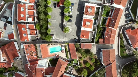 Top-Down Aerial View of Red Rooftops and a Pool in Obidos, Portugal Stock-Footage 345841873