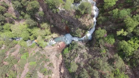 Top Down Aerial View Of River And Waterfall In Rocky Canyon 4K Stock Footage 333598037
