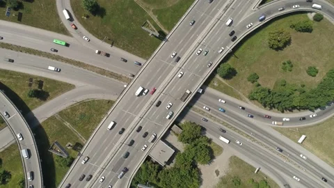 Top down aerial view of Road junction with car traffic in a city. Stock Footage 134861501