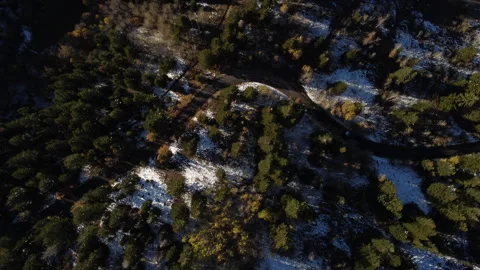 Top-Down Aerial View of Road in Utah with Snow in the Fall Stock Footage 276414921