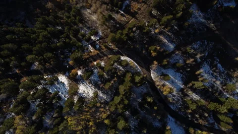 Top-Down Aerial View of Road in Utah with Snow in the Fall with Rotation Stock Footage 276415014