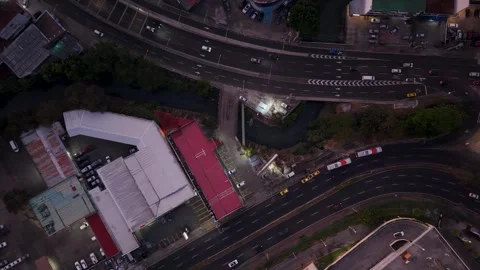 Top Down Aerial View of Roads and Traffic in Panama City Lowering Drone Shot 動画素材 337942230