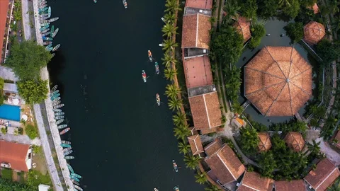 Top down aerial view of rowing boats taking tourists around sights of Ninh Binh Video stock 125526928