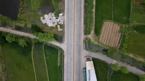 Top Down Aerial View of Rural Highway Intersection and Traffic Flow 4K Stock Footage 334046821
