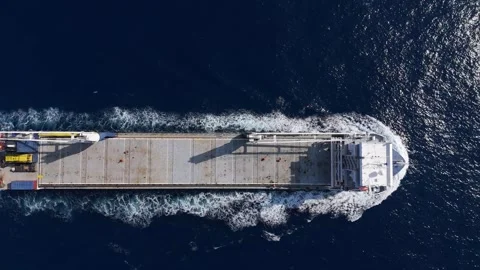 Top-down aerial view of sailors working on a cargo ship deck. Stock Footage 334851086