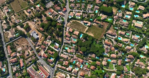 Top down aerial view of Saint-Tropez, France. Drone flying over houses near the Stock Footage 219546518