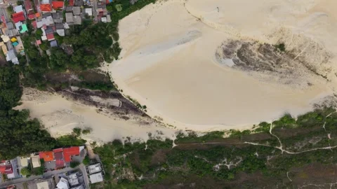 Top Down Aerial View of Sand Dunes Meeting City in Florianopolis Video stock 330996697