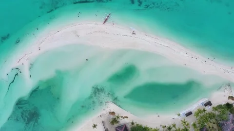Top-down aerial view of sandbar and shallow turquoise water Stock Footage 325670534