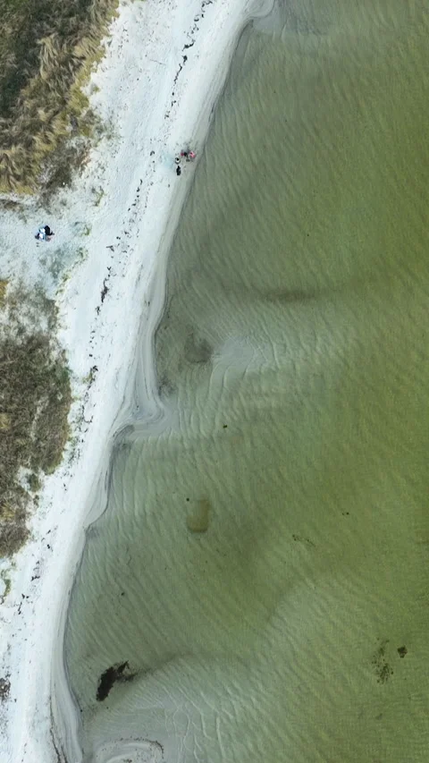Top Down Aerial View Of Sandy Beach And Shallow Coastal Water Stock Footage 342251076