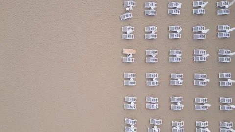Top Down Aerial View of Sandy Beach with Rows of Sunbeds Area Vídeos de archivo 347061009