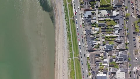 Top Down Aerial View of Seaside Town, Parallel Road and Beach of Skerries Stock-Footage 314428013