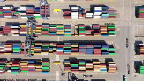 Top down aerial view shipping containers port import export England UK Stock Footage 317289480