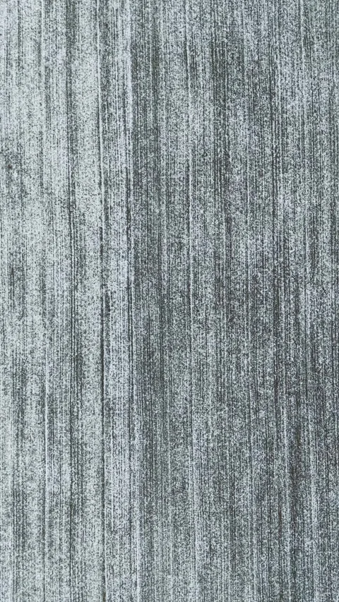 Top down aerial view of snow covered field texture with vertical lines Stock Footage 329139900