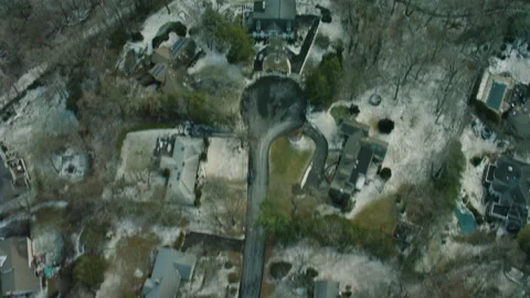 Top down aerial view of snowy residential area in New York during winter in dim Stock-Footage 199455861