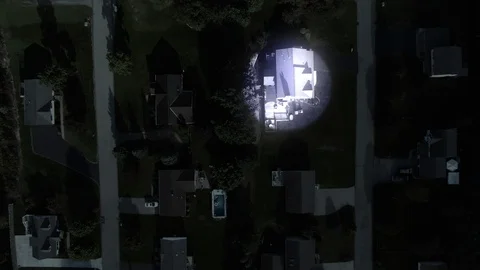 Top Down Aerial View of Spotlight on Residential Homes Stock Footage 95095216