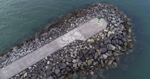 Top Down Aerial View of a Stone Breakwater and Beacon The Concept of Guidan.. Vídeo Stock 327814556