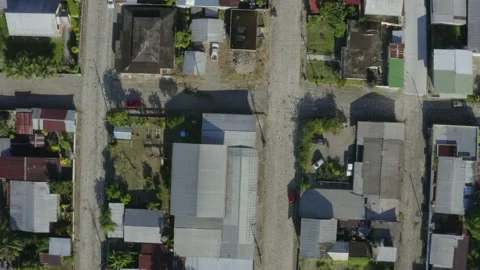 Top down aerial view of a street with small houses Video stock 146343752
