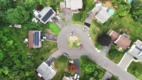 Top-down aerial view of a suburban neighborhood in the USA... Stock Footage 340291107