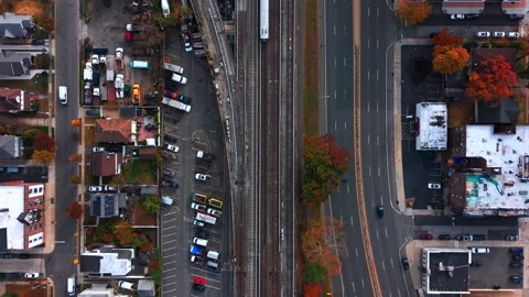 A top down, aerial view of Sunrise Highway running parallel to the Long Island Stock-Footage 320592586