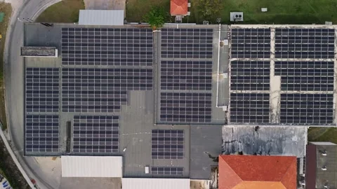 Top down aerial view of technical building with solar panels on flat roof Vidéo 274485998