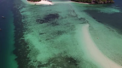 Top-down aerial view of the Thale Waek split sea sandbar and coral reefs in Stock Footage 348009991