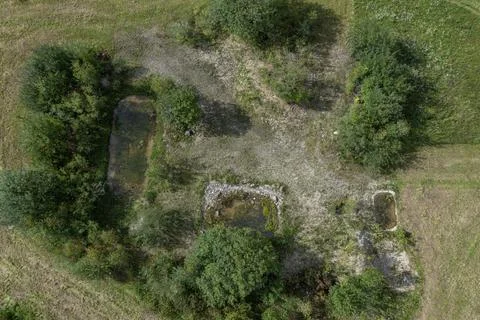 Top down aerial view at three ponds with green trees. Stock Photos