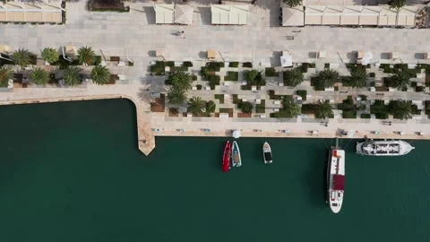 Top-down aerial view of the town of Grand Split harbor and Riva boardwalk. Video stock 171829395