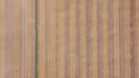 Top Down Aerial View of Tractor Moving across Field Video stock 342778513