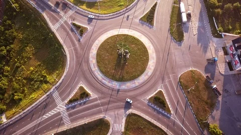 Top down aerial view of a traffic roundabout on a main road. Stock Footage 114760136