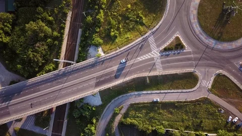 Top down aerial view of a traffic roundabout on a main road. Stock Footage 114760224