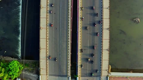 Top Down Aerial View Traffic Crossing Bridge Over River Near Tirtonadi Dam Solo Stock Footage 340485714