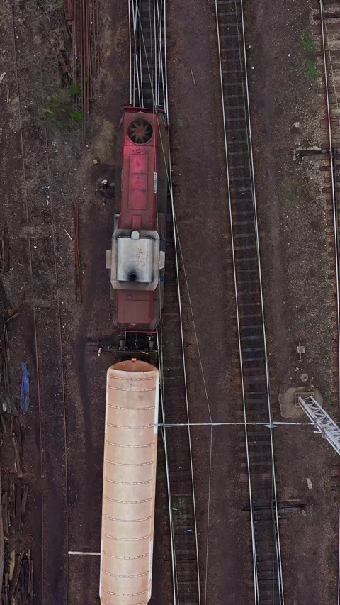 Top down aerial view of a train track and trains for transportation 스톡 동영상 294793175