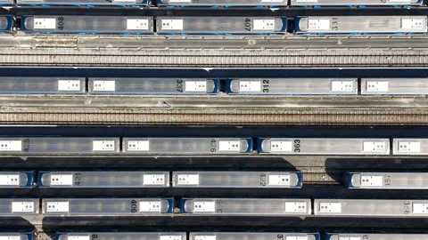 Top down aerial view of trains parked on multiple railway tracks Stock Footage 339263331
