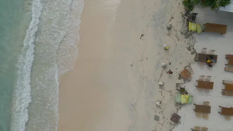 Top Down Aerial View Of Tropical Beach Resort With Turquoise Waves Stock Footage 340578338