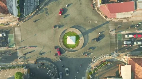 Top down aerial view of Tugu Yogyakarta roundabout Stock Footage 342584119