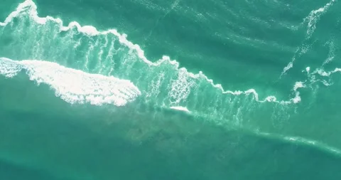 Top Down Aerial View of a Turquoise Ocean The Concept of a Calm Background Stock Footage 317387369