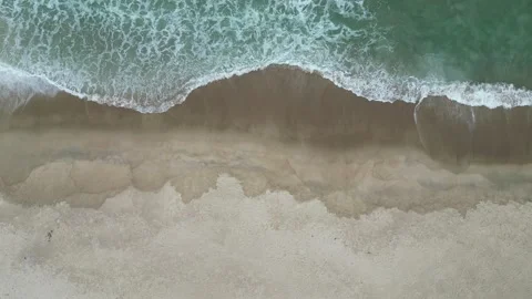 Top Down Aerial View of Turquoise Wave Breaking on Sandy Beach, Brazil Vídeos de archivo 334614142