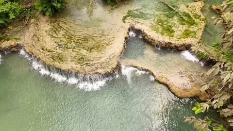 Top Down Aerial View of Turquoise Pools and Limestone Terraces, Kuang Si Laos Stock-Footage 347422425