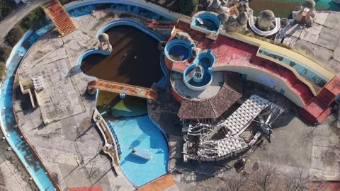 Top Down Aerial View of Water Park Slides and Walkways Stock Footage 324889765