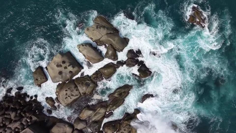 Top Down Aerial View of Waves Crashing at Chaojing Park Keelung Taiwan Stock Footage 343940621