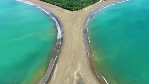 Top down aerial view of Whale Tail sandbar and ocean currents in Uvita, Costa Ri Stock Footage 328129615