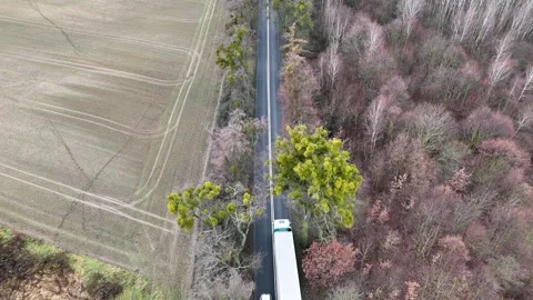 Top Down Aerial View of White Truck and Car on Country Road Stock Footage 323722299