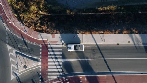 Top Down Aerial View of White Pickup Truck Reversing on Street Stock Footage 344529622