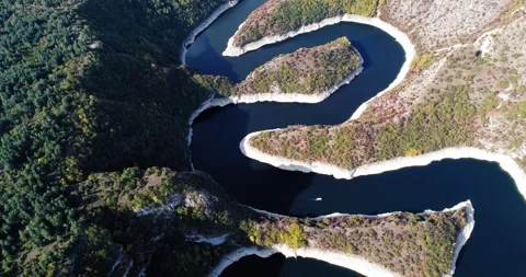 Top-down aerial view of winding Uvac River bends Stock Footage 325671450