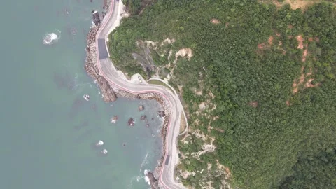 Top Down Aerial View of Winding Coastal Road Along Korean Coastline Stock Footage 343195143