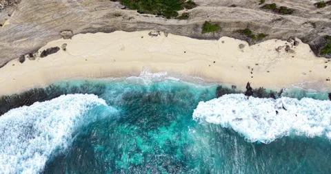 Top Down Aerial of Waves Crashing on Diamond Beach Shoreline, Nusa Penida Bali Stock Footage 331211184